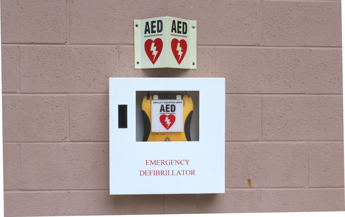 AED cabinet with signage